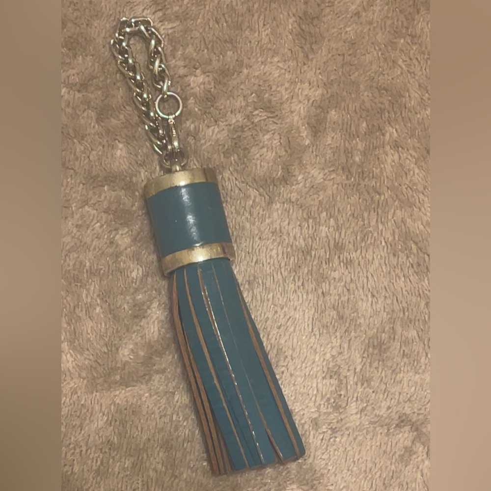 Unbranded turquoise and gold tassel/hangtag